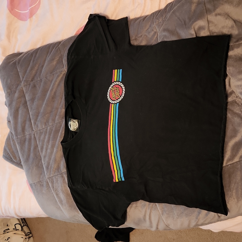 Santa Cruz black t-shirt with colored stripes.